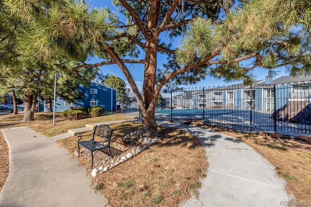 surrounding community featuring fence