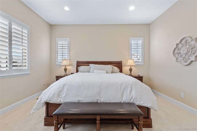 bedroom with light carpet, baseboards, and recessed lighting