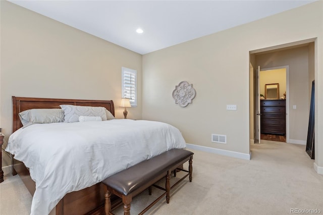 bedroom featuring recessed lighting, light colored carpet, visible vents, and baseboards