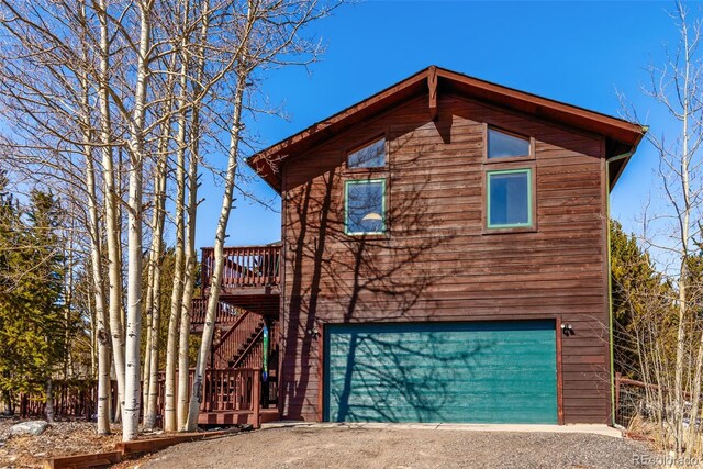 16 Thurber Ct, Fairplay, CO 80440 - chalet / cabin featuring stairway and a garage