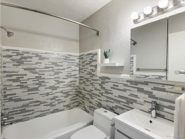 1130 N N Pennsylvania St Unit 306, Denver, CO 80203 - full bath with a textured wall, shower / bath combination, tile walls, vanity, and tasteful backsplash