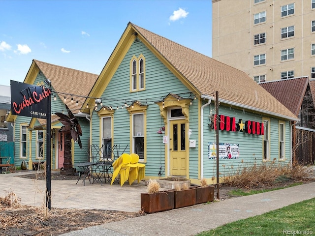 1130 N N Pennsylvania St Unit 306, Denver, CO 80203 - view of front of property with roof with shingles