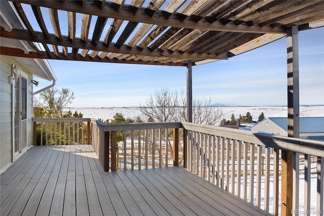 wooden terrace with a pergola and a water view