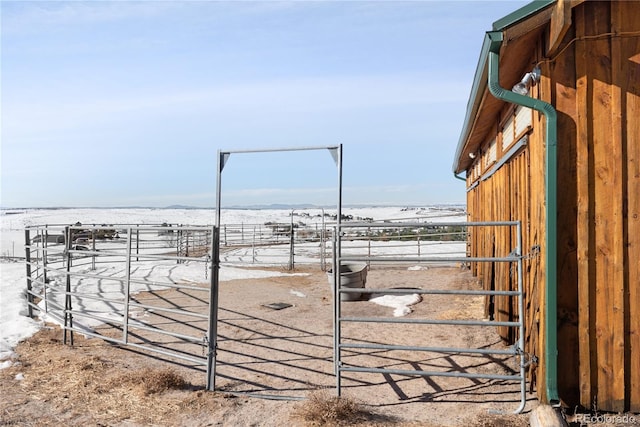 view of yard featuring a beach view and a water view