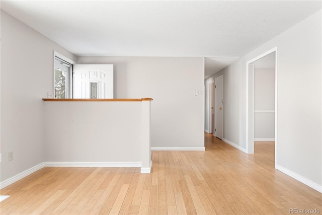 empty room featuring light hardwood / wood-style floors