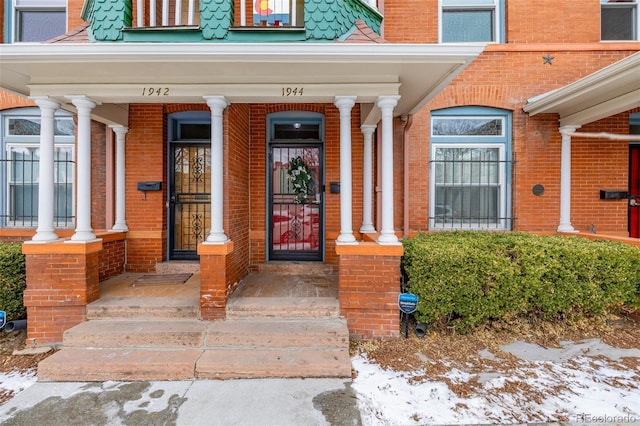 entrance to property with covered porch