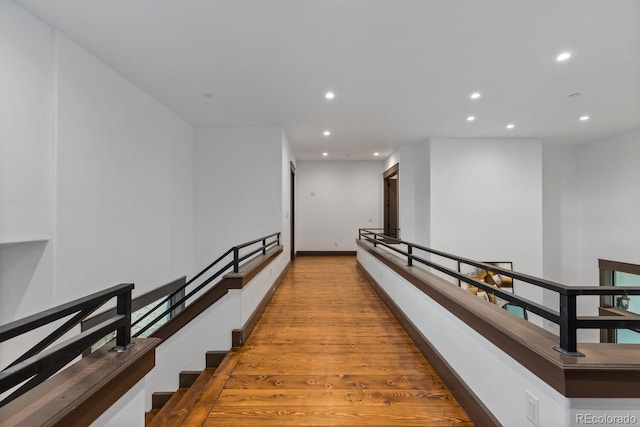 11790 Huckleberry Dr, Franktown, CO 80116 - corridor with recessed lighting and wood finished floors