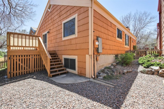 10262 W Ida Ave Unit 243, Littleton, CO 80127 - view of home's exterior with stairs and a wooden deck