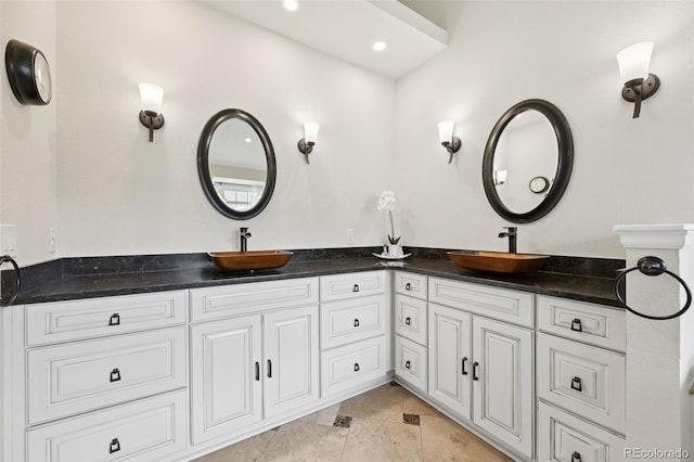 9385 Prairie View Dr, Highlands Ranch, CO 80126 - full bath featuring double vanity and tile patterned floors