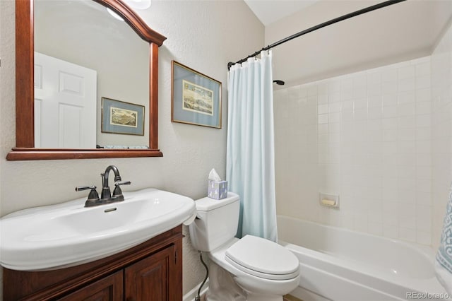 9385 Prairie View Dr, Highlands Ranch, CO 80126 - bathroom featuring a textured wall, vanity, and shower / bath combo with shower curtain