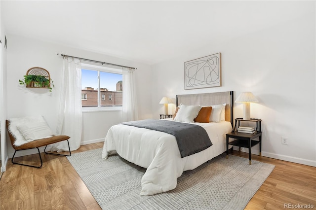 bedroom featuring light wood-type flooring