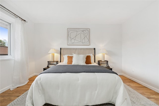 bedroom featuring hardwood / wood-style floors