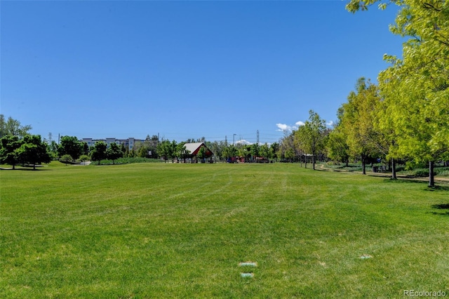 10035 E Mexico Ave, Aurora, CO 80247 - view of community featuring a lawn