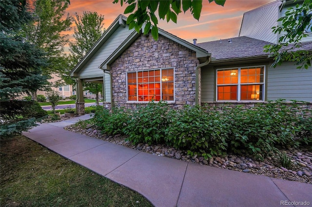 view of property exterior at dusk