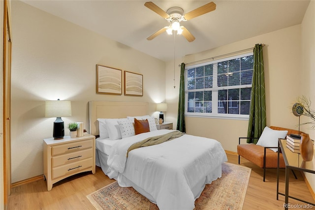 bedroom featuring ceiling fan and light hardwood / wood-style flooring