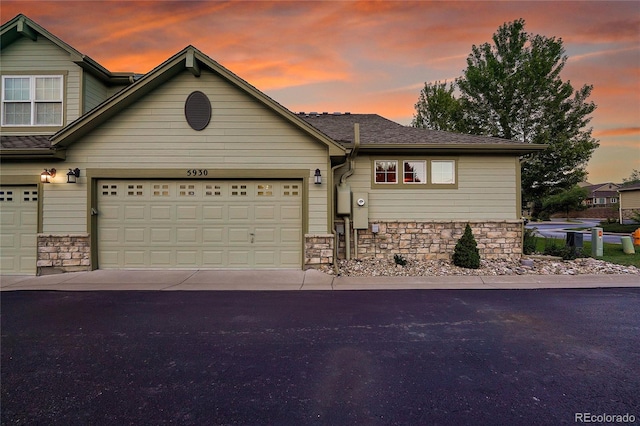 view of front of property with a garage