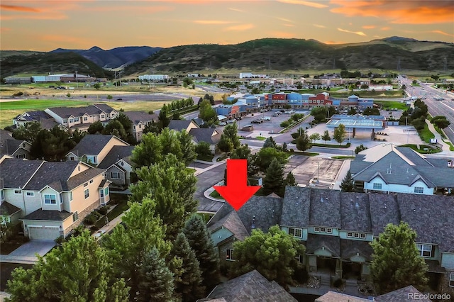 aerial view at dusk with a mountain view