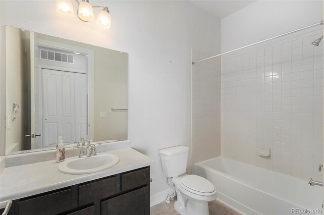 301 Inverness Way S Unit 202, Englewood, CO 80112 - full bathroom featuring toilet, vanity, and shower / tub combination