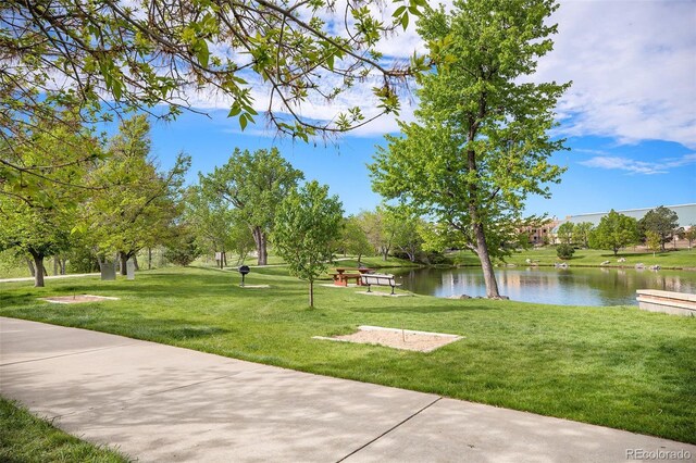 301 Inverness Way S Unit 202, Englewood, CO 80112 - view of home's community with a water view and a yard