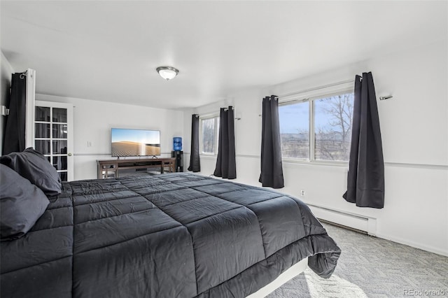 bedroom featuring carpet floors and a baseboard radiator