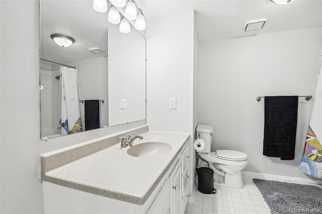 bathroom featuring toilet, a shower with shower curtain, vanity, baseboards, and tile patterned floors