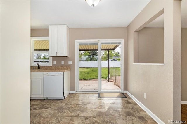 5142 S Pennsylvania St, Littleton, CO 80121 - doorway featuring a sink, baseboards, and stone finish floors