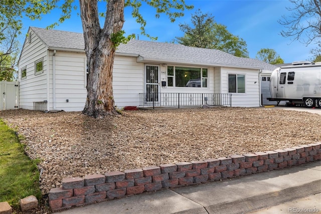 5142 S Pennsylvania St, Littleton, CO 80121 - ranch-style home with fence and roof with shingles