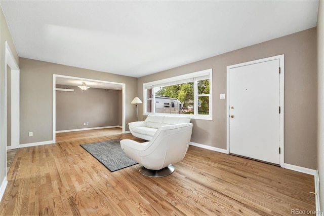 5142 S Pennsylvania St, Littleton, CO 80121 - living area featuring baseboards and light wood-type flooring