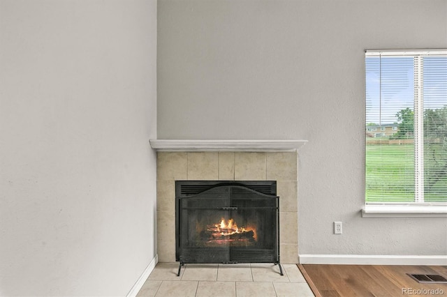 10349 W Fair Ave Unit A, Littleton, CO 80127 - detailed view of a fireplace and baseboards