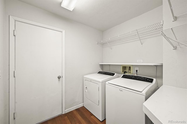 10349 W Fair Ave Unit A, Littleton, CO 80127 - laundry room featuring separate washer and dryer, dark wood-style floors, and baseboards