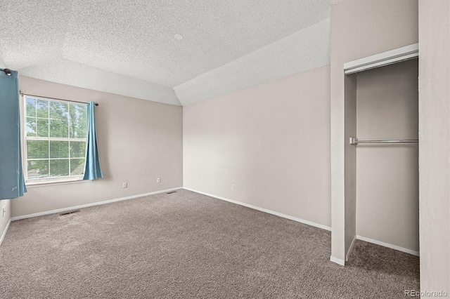 10349 W Fair Ave Unit A, Littleton, CO 80127 - unfurnished bedroom featuring carpet, a textured ceiling, baseboards, and a closet