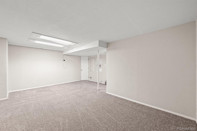 10349 W Fair Ave Unit A, Littleton, CO 80127 - carpeted empty room with baseboards