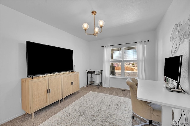 3838 Brush Rd, Castle Rock, CO 80108 - home office with light colored carpet, baseboards, and a chandelier