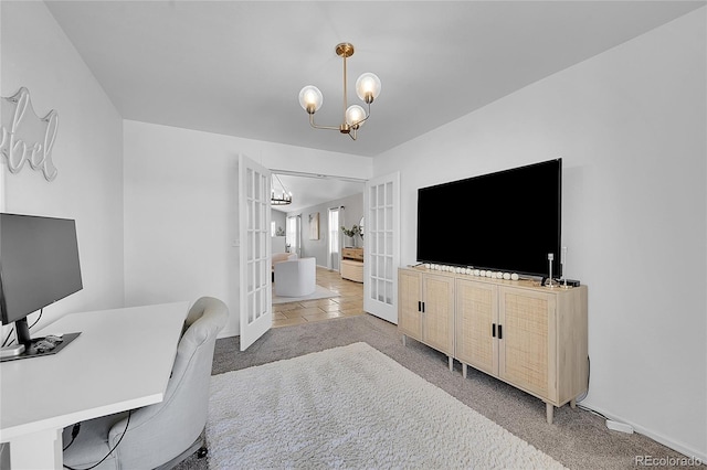 3838 Brush Rd, Castle Rock, CO 80108 - home office featuring french doors, a chandelier, carpet floors, and baseboards