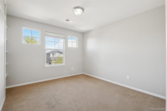 13075 Tamarac St, Thornton, CO 80602 - carpeted spare room featuring baseboards