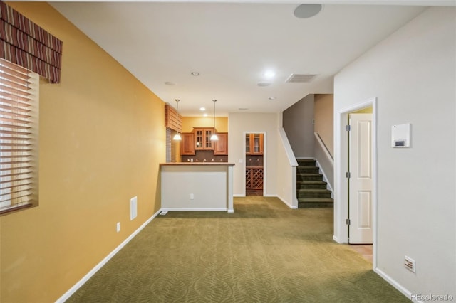 13075 Tamarac St, Thornton, CO 80602 - unfurnished living room featuring carpet floors, stairway, baseboards, and recessed lighting