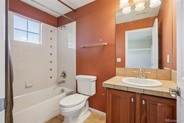 13075 Tamarac St, Thornton, CO 80602 - bathroom featuring shower / tub combo, toilet, vanity, and tile patterned flooring