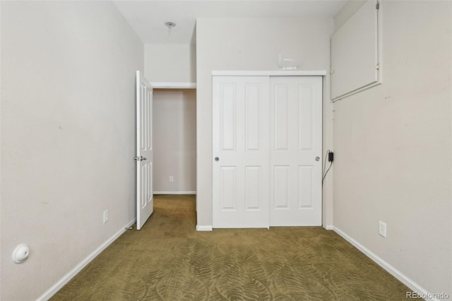 13075 Tamarac St, Thornton, CO 80602 - unfurnished bedroom with baseboards, carpet, and a closet