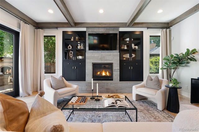 852 Pontiac St, Denver, CO 80220 - living room featuring a fireplace, beam ceiling, recessed lighting, and wood finished floors