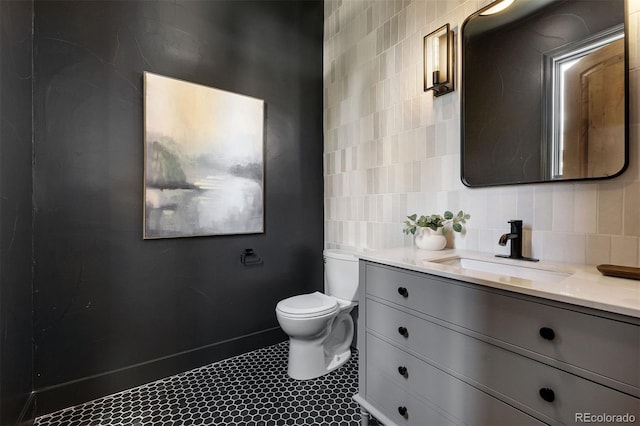852 Pontiac St, Denver, CO 80220 - bathroom with vanity, tile patterned flooring, and tasteful backsplash