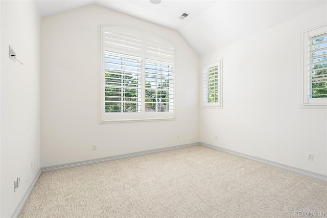 852 Pontiac St, Denver, CO 80220 - carpeted spare room with vaulted ceiling and baseboards