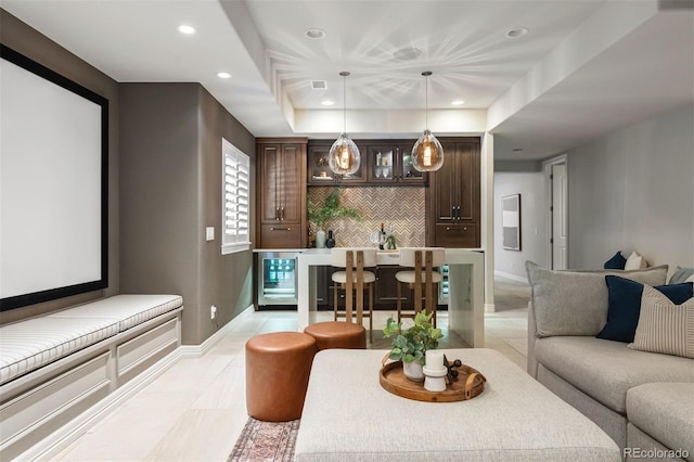 852 Pontiac St, Denver, CO 80220 - cinema room featuring wine cooler, light tile patterned flooring, recessed lighting, and bar