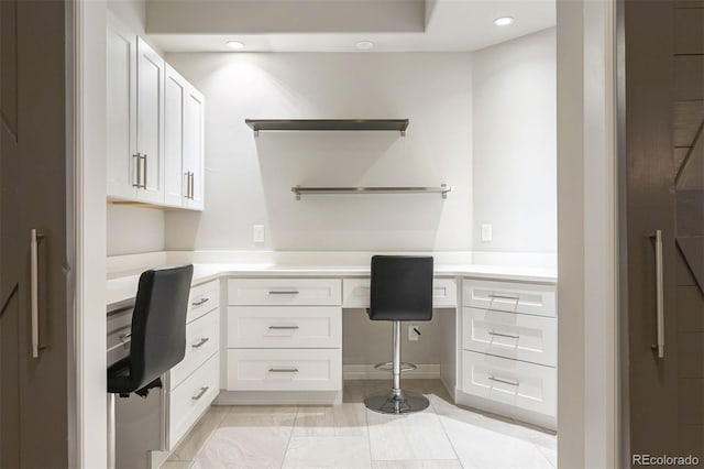 852 Pontiac St, Denver, CO 80220 - office featuring built in study area, recessed lighting, and light tile patterned floors