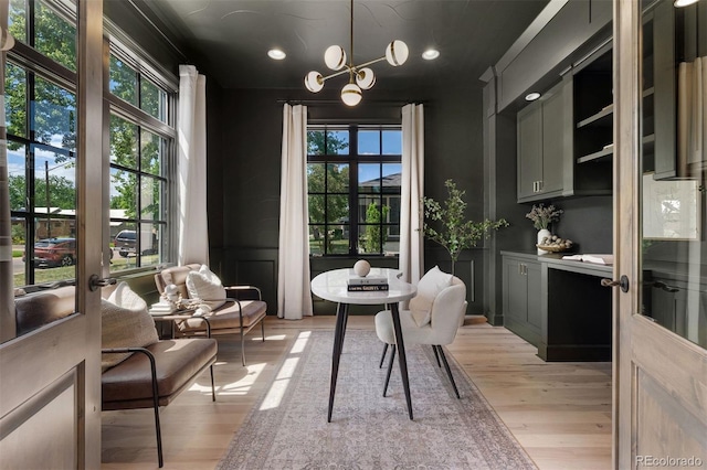 852 Pontiac St, Denver, CO 80220 - dining space featuring light wood-type flooring, recessed lighting, a chandelier, and french doors