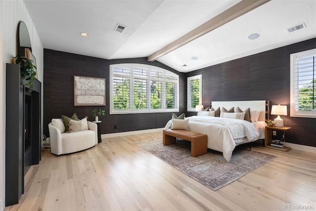 852 Pontiac St, Denver, CO 80220 - bedroom featuring light wood-style flooring and an accent wall