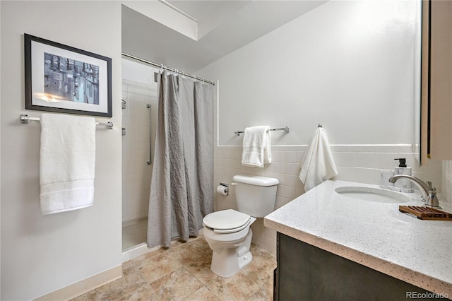 bathroom featuring vanity, toilet, tile walls, and a shower with curtain