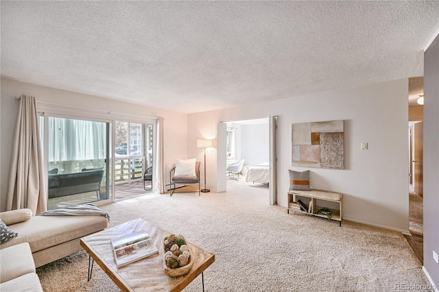 carpeted living room with a textured ceiling