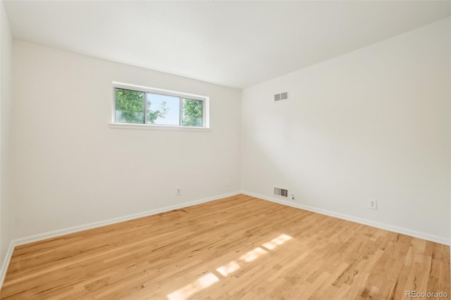 6155 Carr St, Arvada, CO 80004 - unfurnished room featuring light wood finished floors and baseboards