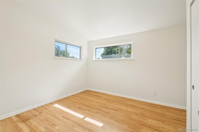 6155 Carr St, Arvada, CO 80004 - spare room with light wood-style floors and baseboards