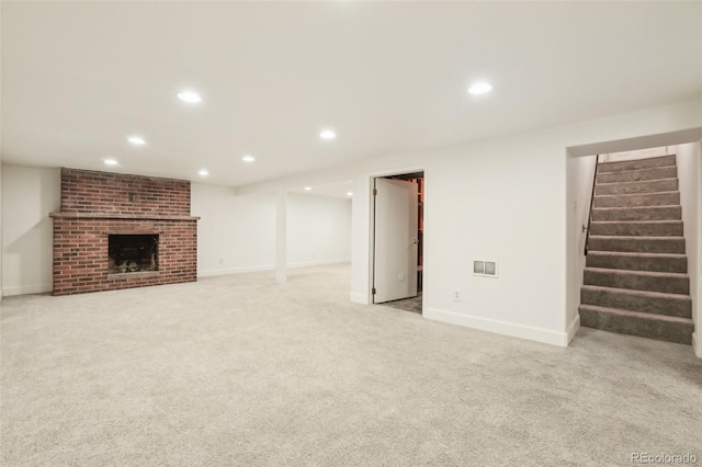 6155 Carr St, Arvada, CO 80004 - unfurnished living room with stairs, light colored carpet, recessed lighting, and baseboards